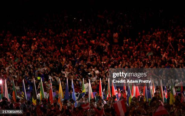 General view as flag bearers parade with their national flags during the closing ceremony on day eleven of the Paris 2024 Summer Paralympic Games at...
