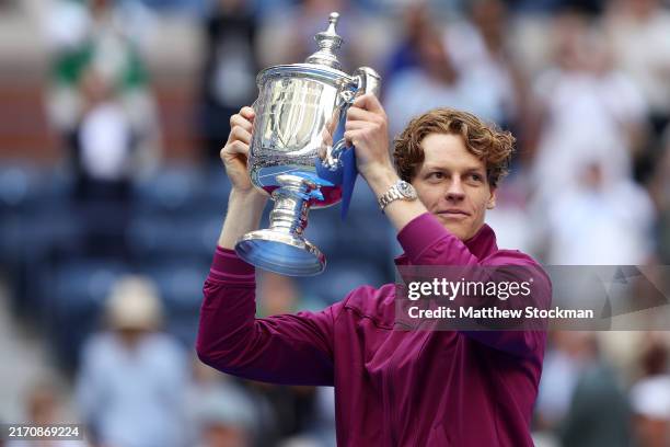 Jannik Sinner of Italy celebrates with the winners trophy after defeating Taylor Fritz of the United States to win the Men's Singles Final on Day...