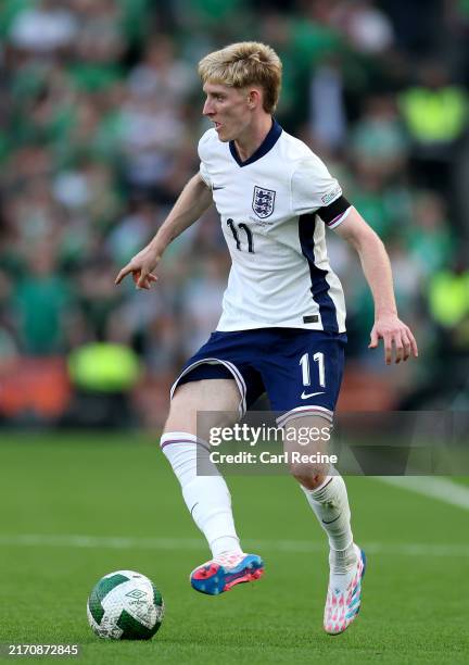 England's Anthony Gordon runs with the ball during the UEFA Nations League 2024/25 League B Group B2 match between Republic of Ireland and England at...