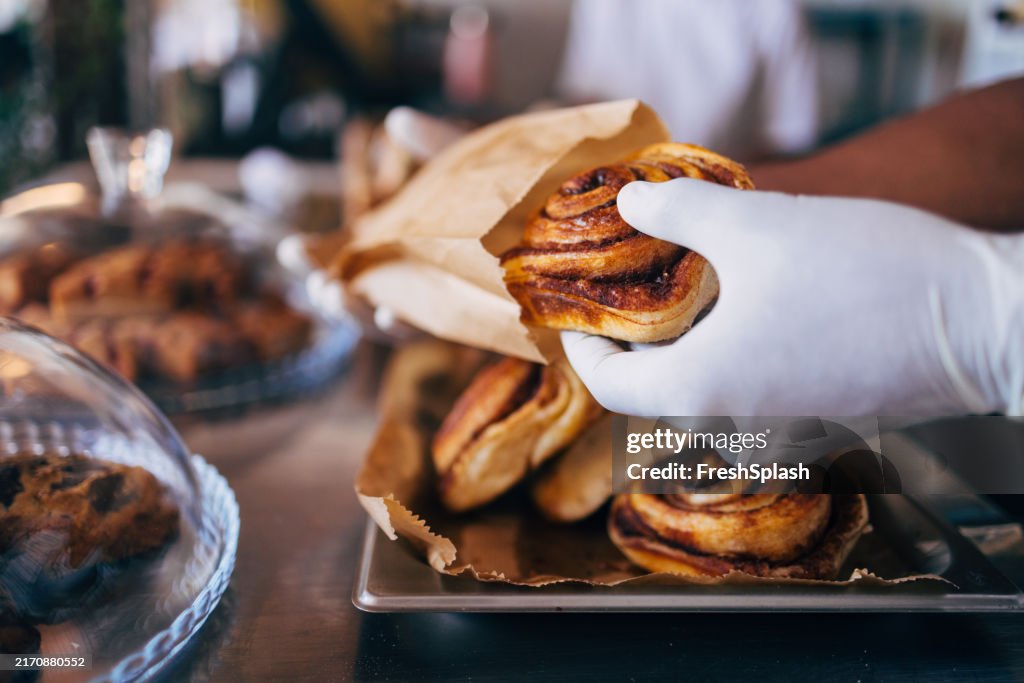 Fresh Cinnamon Rolls Served in a Bakery Setting