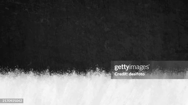 horizontal empty blank wispy rustic modern art grunge textured divided painted background with one smoky powdered splash spotted spray white paint splattered label stripe at bottom edge border of weathered smudged black wall with copy space - powder snow stock illustrations
