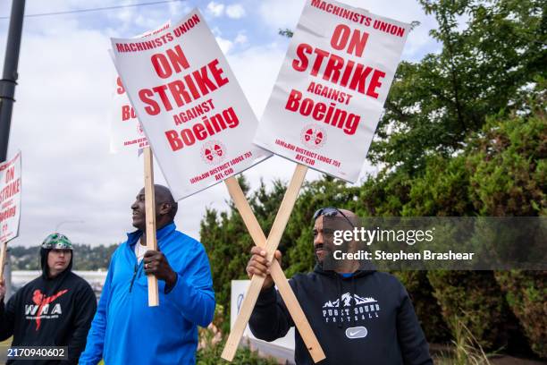 Boeing Machinists union members picket outside a Boeing factory on September 13, 2024 in Renton, Washington. The union voted overwhelmingly to reject...