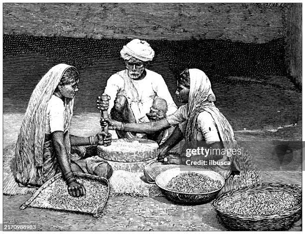 antique illustration: grinding millet, india - grinding stock illustrations