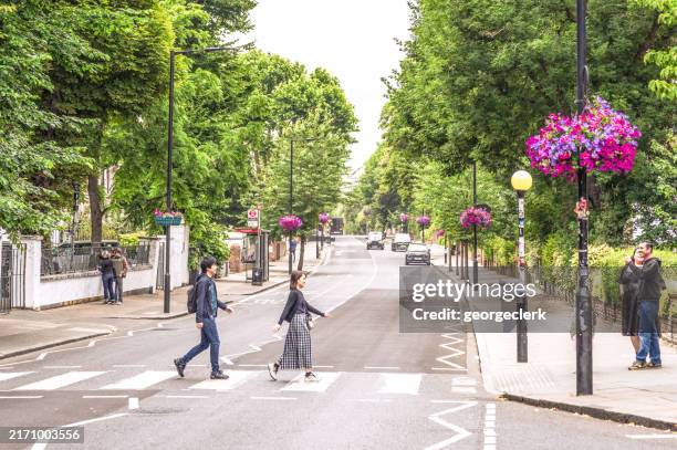 famous abbey road crossing in london - crossing sign stock pictures, royalty-free photos & images