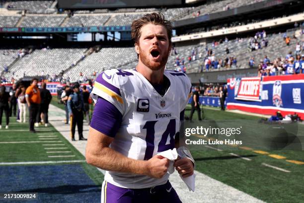 Sam Darnold of the Minnesota Vikings reacts after defeating the New York Giants at MetLife Stadium on September 08, 2024 in East Rutherford, New...
