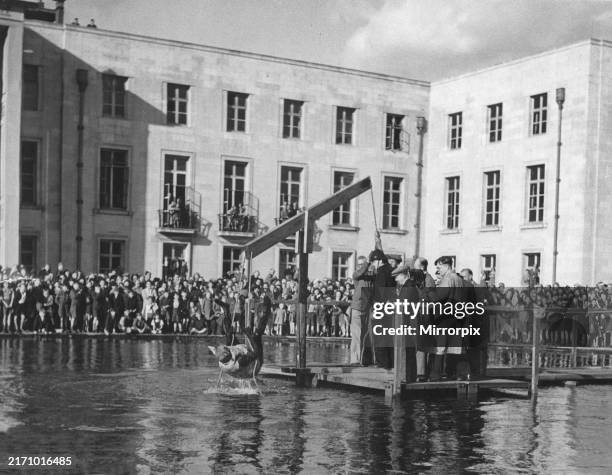 Public trial and ducking of the Squander Bug at the Walthamstow Thanksgiving Week. 23 September 1945