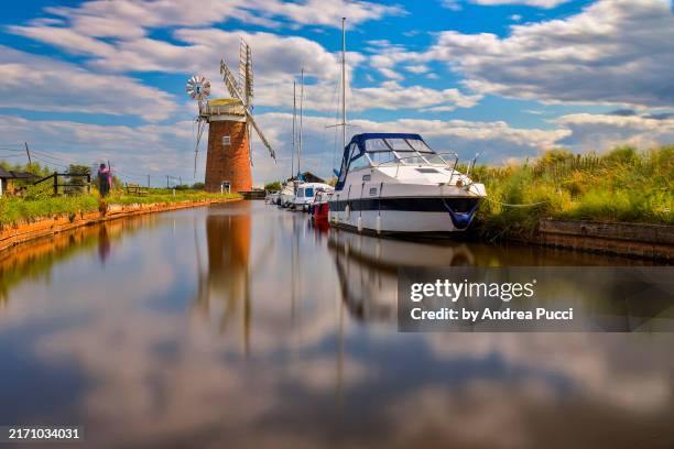 horsey windpump, horsey, norfolk, united kingdom - boat stock pictures, royalty-free photos & images