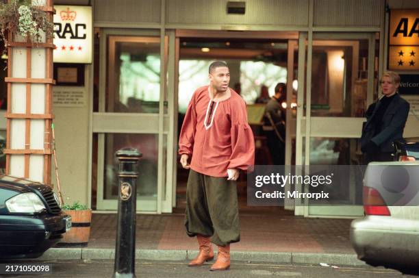 Moat House Hotel, Liverpool, 13th January 1997, John Barnes, Liverpool football player leaving hotel after belated Christmas fancy dress party.