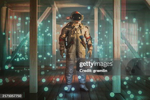 Cosmonaut standing in old rural house Cosmonaut standing in old rural house