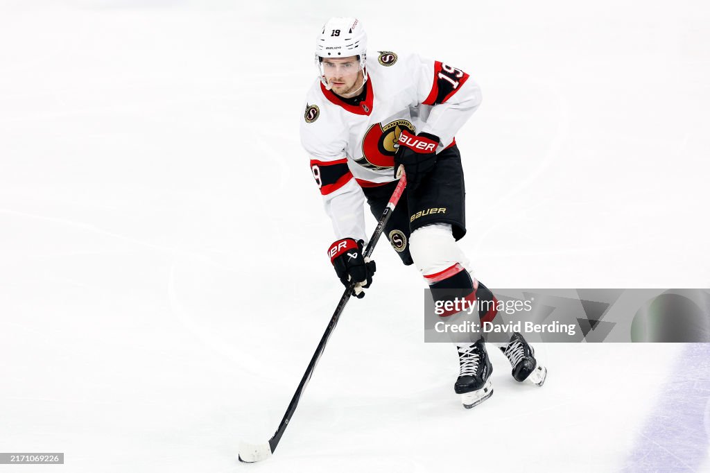 Batherson Drake Batherson of the Ottawa Senators skates with the puck against ...