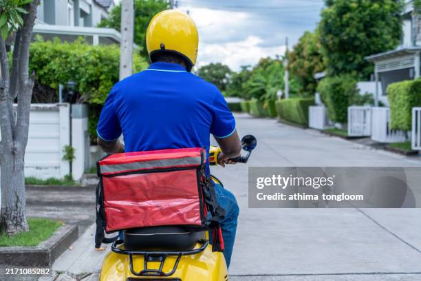African Delivery Rider 124 African Delivery Motorbike Stock Photos, High-Res Pictures, and ...