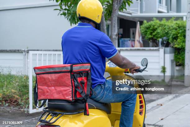 African Delivery Rider 123 African Delivery Motorbike Stock Photos, High-Res Pictures, and ...