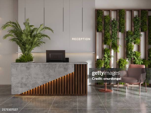 luxury hotel entrance with reception desk, armchair and vertical garden - medical reception area stock pictures, royalty-free photos & images