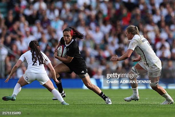 New Zealand's Ruby Tui tries to escape a tackle during the autumn international women's rugby union match between England and New Zealand at Allianz...