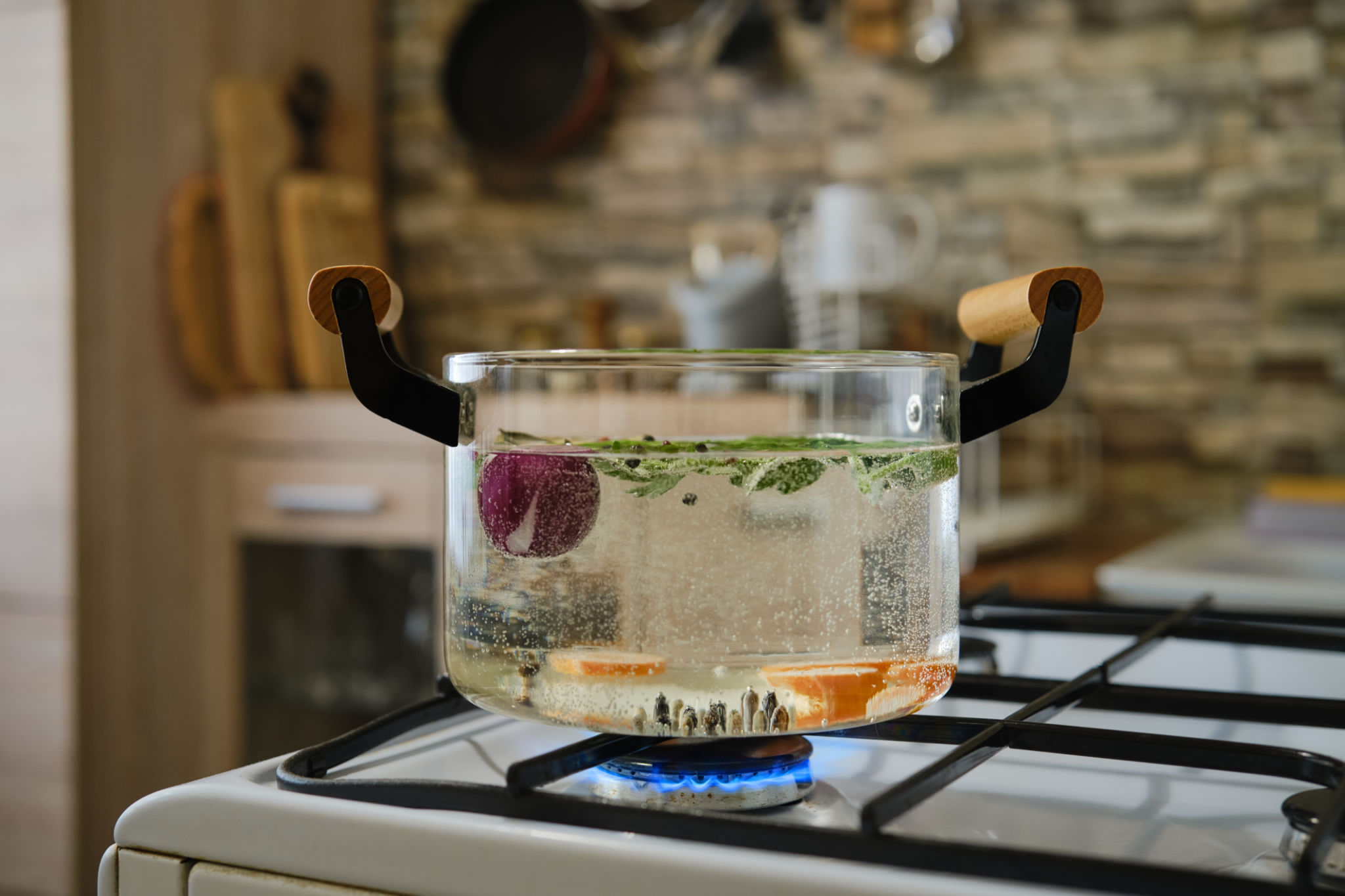 Herbal tea boiling in borosilicate glass teapot, non toxic, eco-friendly tea products. Herbal tea boiling in borosilicate glass teapot, non toxic, eco-friendly tea products.