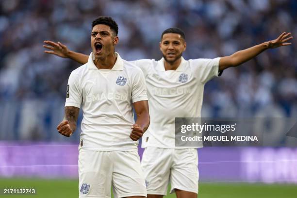 Marseille's Brazilian forward Luis Henrique celebrates after scoring his team's second goal during the French L1 football match between Olympique...