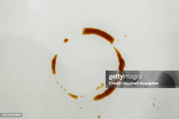 coffee stain on a white background - cafe au lait spots stock pictures, royalty-free photos & images