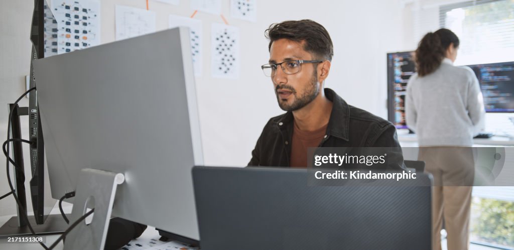 Hispanic Latin American couple, software engineer developer use computer, work on program coding together at home office. Programming language development technology, freelance job concept