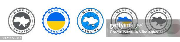 set of made in ukraine labels, product emblem variants with country map and flag isolated on white background. - ukrainian culture stock illustrations