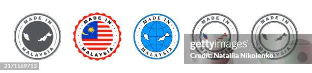 Set Of Made In Malaysia Labels Product Emblem Variants With Country Map And Flag Isolated On White Background High-Res Vector Graphic
