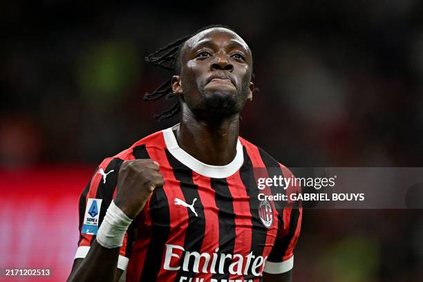 Milan's British forward Tammy Abraham celebrates scoring his team's fourth goal during the Italian Serie A football match between AC Milan and...