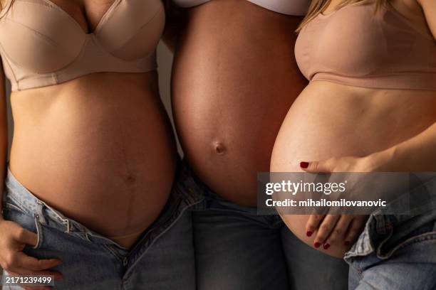 pregnant women - pregnant body stock pictures, royalty-free photos & images
