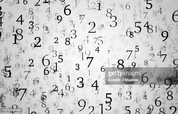 random scattered numbers with shallow depth of field - financial figures stock pictures, royalty-free photos & images