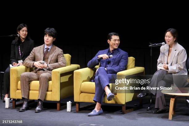 Lee Dong-wook and Hyun Bin speak onstage at the "In Conversation With... Hyun Bin and Lee Dong-wook" panel during the 2024 Toronto International Film...