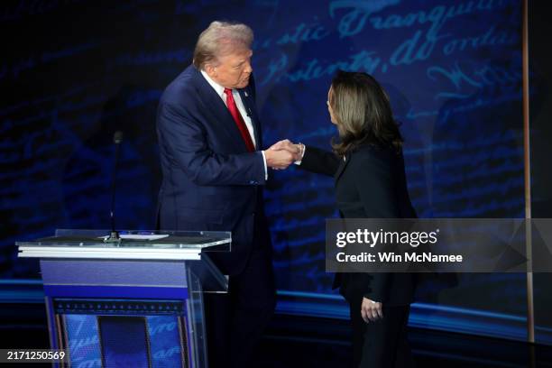 Republican presidential nominee, former U.S. President Donald Trump and Democratic presidential nominee, U.S. Vice President Kamala Harris greet as...