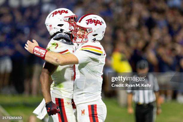 Kaden Prather and Billy Edwards Jr. #9 of the Maryland Terrapins celebrate a touchdown in the second half during a game against the Virginia...