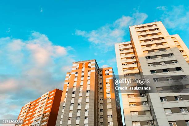 residential buildings at sunset - gijón fotografías e imágenes de stock