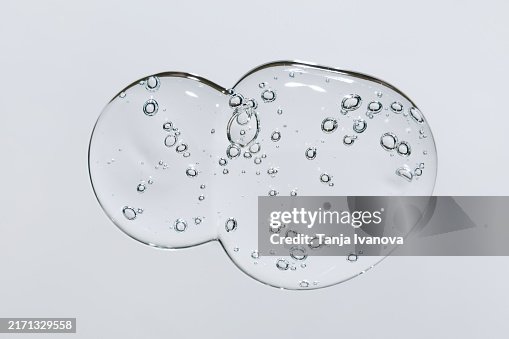 Transparent drop of Gel on white background. Liquid hyaluronic acid gel Transparent drop of Gel on white background. Liquid hyaluronic acid gel
