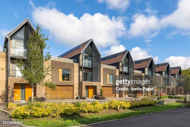 a row of luxury terraced houses in cambridge, uk - housing development stock pictures, royalty-free photos & images