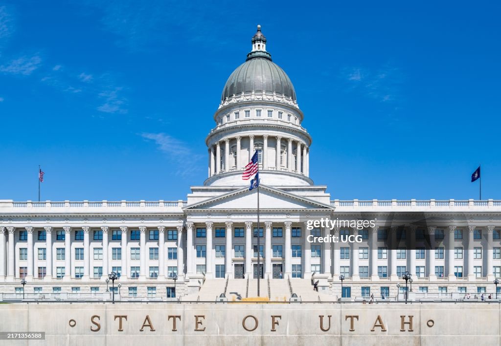 American flag flying over the Utah State Capitol building in Salt Lake City, Utah
