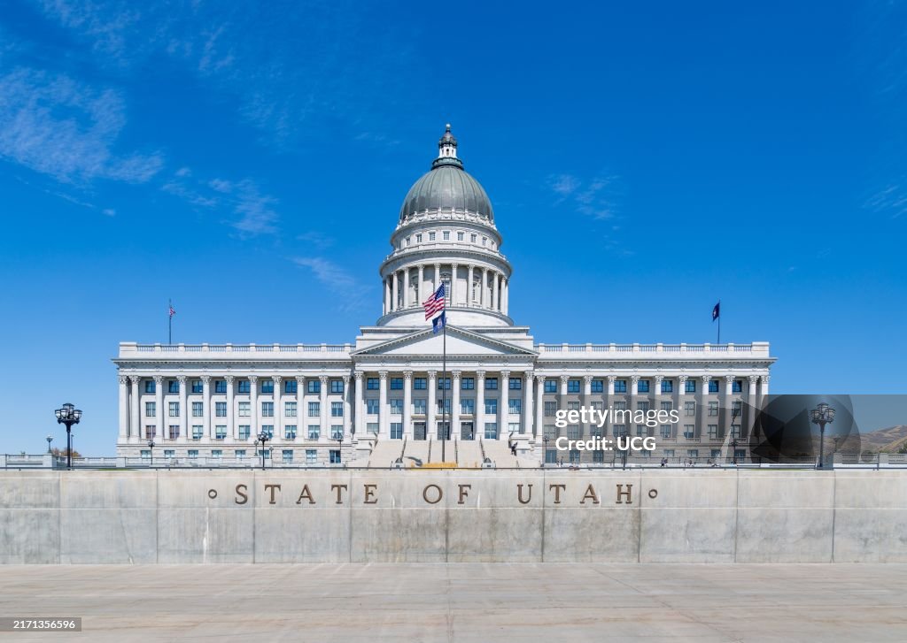 American flag flying over the Utah State Capitol building in Salt Lake City, Utah