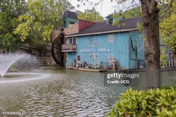 Mural on the side of the Mountain Laurel Home store at the Dollywood amusement park in Pigeon Forge, TN.