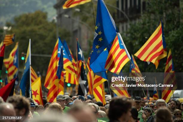Catalan pro independene flags wave during a demonstration on September 11, 2024 in Barcelona, Spain. The National Day of Catalonia, also called...