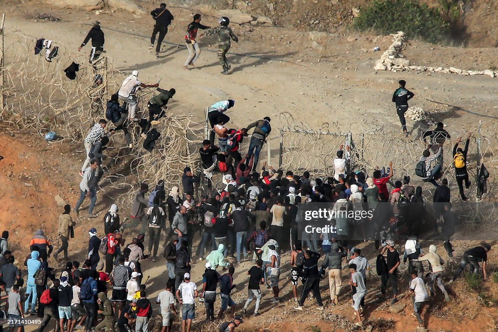 TOPSHOT-MOROCCO-SPAIN-MIGRATION-BORDER