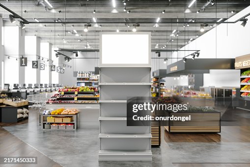 Close-up Of Empty Rack And Billboard In Supermarket With Blurred Background Close-up Of Empty Rack And Billboard In Supermarket With Blurred Background