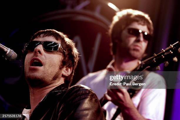 Liam and Noel Gallagher of Oasis perfom live on stage at Wisseloord Studios on June 3, 2005 in Hilversum, Netherlands.