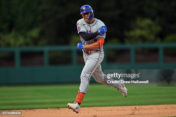 Tyrone Taylor of the New York Mets celebrates a home run as he rounds the bases against the Philadelphia Phillies at Citizens Bank Park on September...