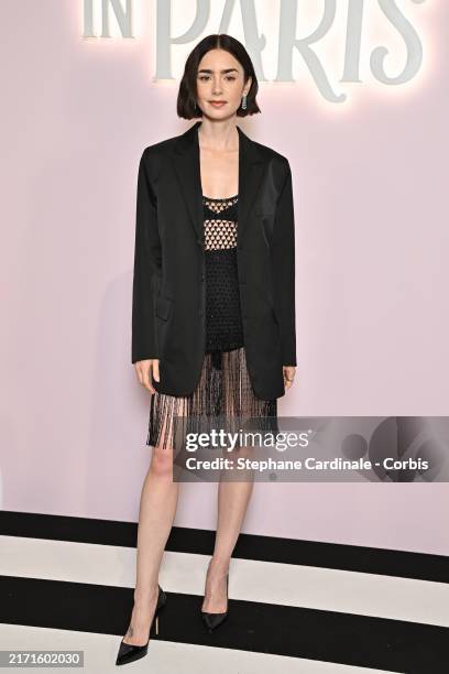 Lily Collins attends the "Emily In Paris" Netflix Photocall at La Samaritaine on September 12, 2024 in Paris, France.