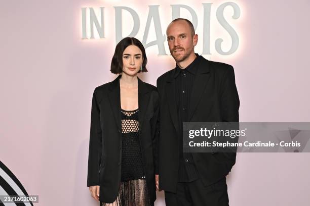 Lily Collins and Charlie McDowell attend the "Emily In Paris" Netflix Photocall at La Samaritaine on September 12, 2024 in Paris, France.