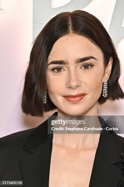 Lily Collins attends the "Emily In Paris" Netflix Photocall at La Samaritaine on September 12, 2024 in Paris, France.