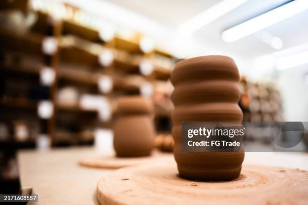 close-up of a ceramic sculpture at the workshop - earthenware stock pictures, royalty-free photos & images