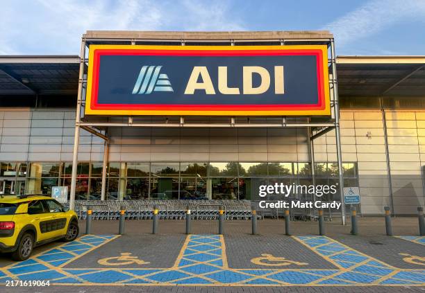 Shoppers enter a branch of the budget supermarket retailer Aldi on September 14, 2024 in Weston-super-Mare, England. The German retailer founded in...