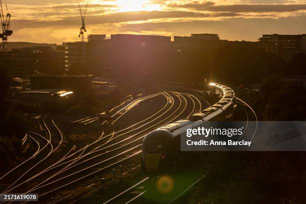 Train arrives at Bristol Temple Meads at sun set, on September 11 2024 in Bristol, England. The Office for National Statistics said gross domestic...