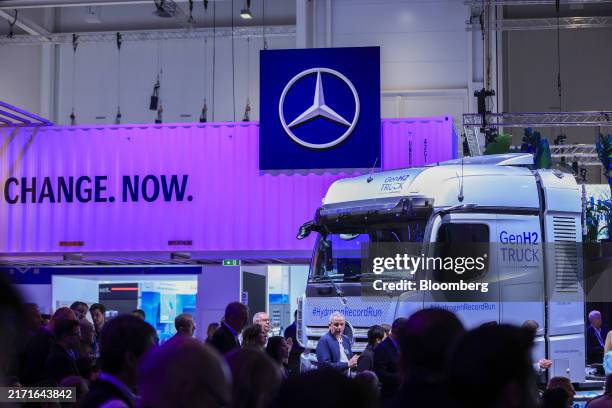 Visitors look at the Mercedes-Benz GenH2 hydrogen fuel cell truck at the IAA Transportation 2024 event in Hanover, Germany, on Monday, Sept. 16,...