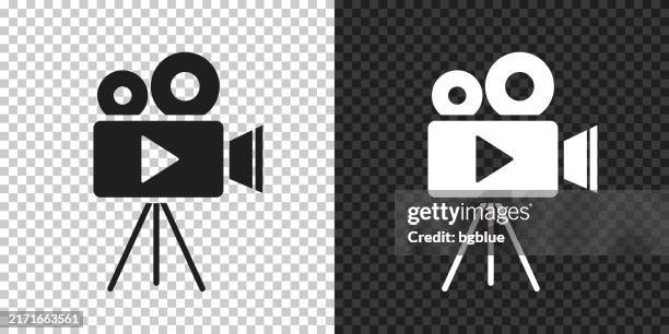 video camera with tripod. icon for design on blank background - film projector stock illustrations