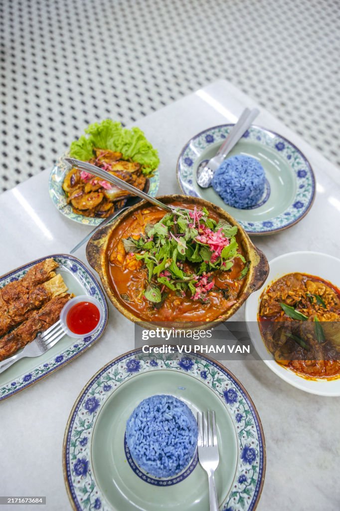 Variation of Peranakan cuisine or Nyonya cuisine flatlay on table
